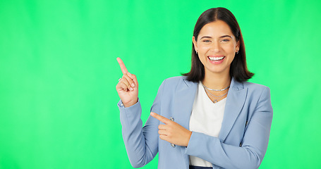 Image showing Business, happy woman and face on green screen pointing to mockup background, studio and smile. Portrait of female worker advertising promotion, product placement and announcement of deal coming soon
