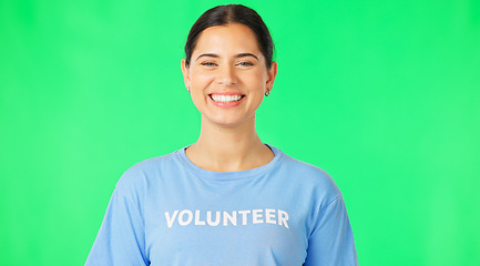 Image showing Volunteer, face and happy woman on green screen in studio for community service, help and welfare. Portrait, female model and volunteering for humanitarian project, social care and support of charity