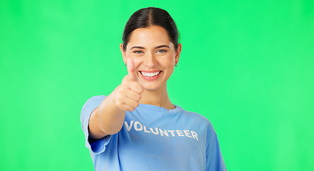 Image showing Happy woman, volunteer and hand in thumbs up on green screen for agreement or success against a studio background. Portrait of female showing thumb emoji, yes sign or like for good job on mockup