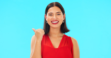 Image showing Woman face, pointing and promotion with beauty and smile showing mockup for advertisement. Portrait, isolated and studio background with a happy young female point to show mock up announcement