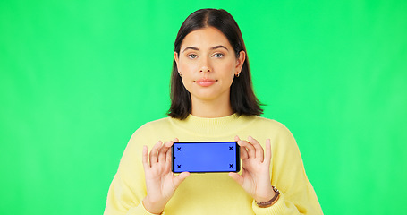 Image showing Phone, green screen and dissatisfied woman isolated on studio background for website mockup and tracking marker. Wrong, fail or face of unhappy person with mobile app mock up for advertising space