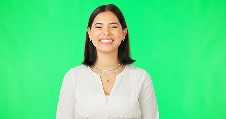 Image showing Smile, woman and face on green screen, studio and color background with confidence, happiness and pride. Portrait of happy young female model in good mood, positive attitude and friendly personality