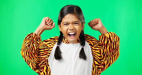 Image showing Face, excited and girl cheering, green screen and happiness with joy against a studio background. Portrait, female child and young person with gesture for victory, winning and motivation with joy