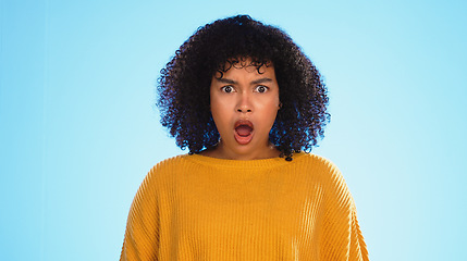 Image showing Surprised, face of black woman in studio, Shocked and wondering on blue background. Doubt, portrait and unsure girl with decision, choice or emoji on mockup, product placement or isolated