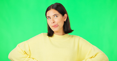 Image showing Green screen, funny face expression and happy woman posing with tongue out, peace sign and carefree personality. Portrait, female model and smile in studio with emoji reactions, meme and happiness