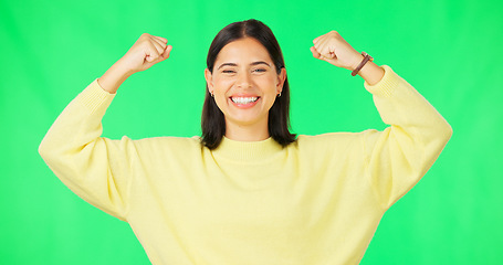 Image showing Strong, happy face and woman muscle flex with green screen and smile from wellness. Gender equality, isolated and studio background with a young female feeling proud and confident from win and youth