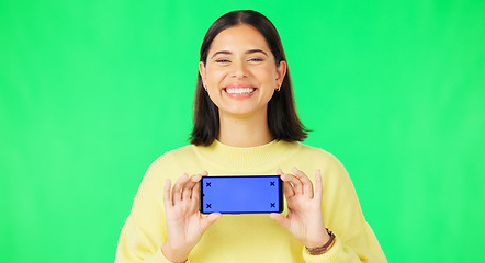 Image showing Happy woman, phone and mockup on green screen with tracking markers for advertising against studio background. Portrait of female with smartphone display for advertisement or marketing on copy space