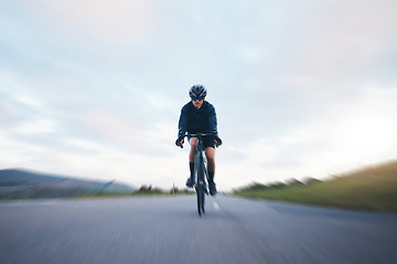 Image showing Fast, race and cycling with woman in road for training, competition and championship. Workout, sports and triathlon with female cyclist riding on bike for freedom, exercise and speed with motion blur