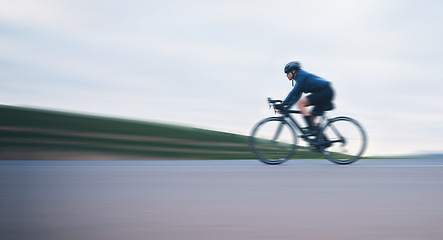 Image showing Motion blur, race and cycling with woman on road for training, competition and championship. Workout, sports and triathlon with female cyclist riding on bike for freedom, exercise and fast with speed