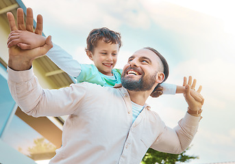 Image showing Happiness, piggyback and father playing with kid outdoor, bonding and having fun. Smile, dad and carrying boy, ride and play together while enjoying quality family time in backyard with care and love