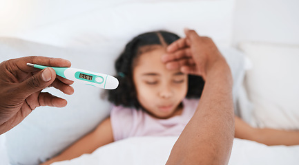 Image showing Parent, hands and thermometer with sick kid checking fever or temperature for flu or cold on bed at home. Hand of adult monitoring child for illness, healthcare or virus in love, care or support