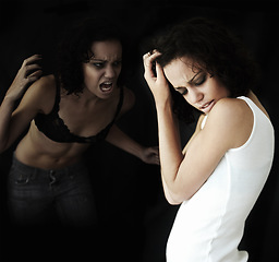 Image showing Anorexia, bipolar and woman with stress, identity crisis and depression against a dark studio background. Female person, model and girl with mental health issue, problem and anxiety with trauma