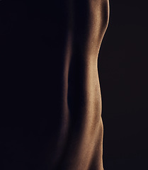 Image showing Nude, stomach and silhouette, woman and closeup, sexy and dark aesthetic, art with skin and sensual on black background. Body, beauty and creative with seduction, desire and naked female in studio