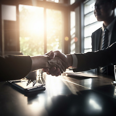 Image showing Business people, handshake and meeting at night for b2b, deal or agreement in corporate meeting at office. Employees shaking hands working late in collaboration, teamwork or hiring and recruitment