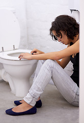 Image showing Bathroom, sick and woman on a floor suffering from anorexia, depression or anxiety. Stress, toilet and female with body dysmorphia, bulimia or an eating disorder, nausea and mental health problem