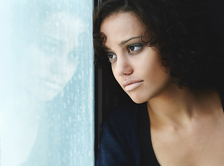 Image showing Sad, rain and reflection with woman by window for depression, tired and lonely. Anxiety, mental health and exhausted with female thinking at home for broken heart, disappointed and fear mockup