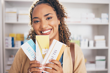 Image showing Pharmacy, medicine or portrait of happy woman with pills or boxes of healthcare products in drugstore. Pharmaceutical sale or customer smiling with supplements package shopping in medical chemist