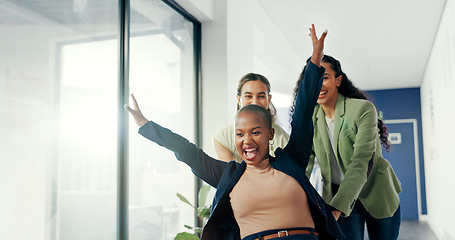 Image showing Office, celebration or happy women push chair to celebrate business profit, investment growth or startup success. Diversity, fun excited people playing or throw financial documents of company revenue