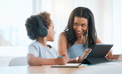 Image showing Elearning, happy and a mother and child with a tablet for education, studying and online class. Smile, teaching and a mom helping a boy kid with homework with technology during homeschooling