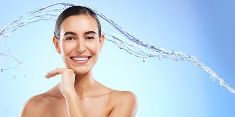 Image showing Water splash, skincare portrait or happy woman with smile or smiling female model face on studio background. Dermatology cosmetics or beautiful girl with facial treatment, beauty or glowing results