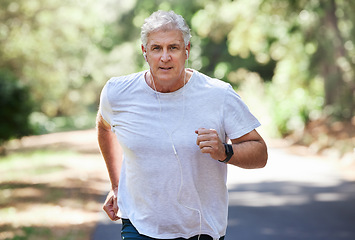 Image showing Exercise, senior man and outdoor with music earphones for run, workout and training for fitness. Elderly male portrait for cardio health, audio and wellness while running in nature and retirement