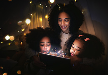 Image showing Tablet, night a mother reading to her kids in a tent while camping in the bedroom of their home together. Black family, story or children with a woman storytelling to her kids at bedtime for bonding