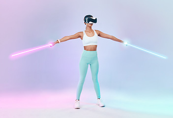 Image showing Game, virtual reality glasses and woman with lightsaber, future and fun against studio background. Female player, gamer or girl with vr eyewear, fantasy game or weapon with confidence and laser saber