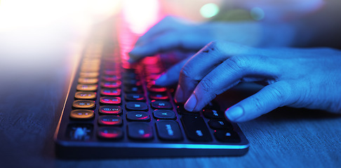 Image showing Hacker, hands and typing on neon keyboard for software, programming or cybersecurity. Developer, it coder and woman on computer keypad for hacking, phishing and dark web malware at night in home.
