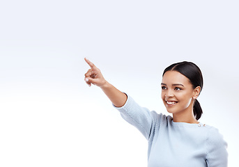 Image showing Mock up, happy and studio woman point at direction mock up, sales promotion information or advertising copy space. Brand commercial offer, presentation or female marketing gesture on white background