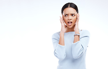Image showing Shock, confused and face of woman upset with hands on head for advertising, copy space and bad news in studio. Emoji reaction, mockup and isolated girl angry, unhappy and surprise on white background