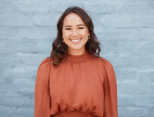 Image showing Asian business woman, portrait and wall background with smile for career success, goals and future. Happy businesswoman, excited face and young corporate worker in city with happiness for company