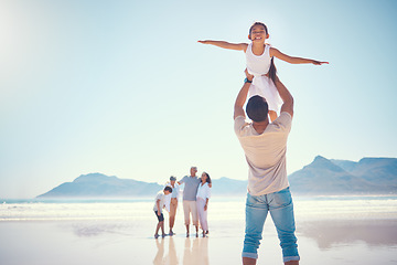 Image showing Beach, family and girl with father, airplane and playing, happy and carefree against blue sky background. Freedom, flying and child with parent, grandparents and sibling on ocean travel or holiday