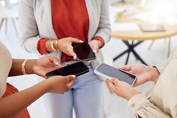 Image showing Collaboration, technology and communication with a team of business people in a huddle to share information. Group, data and networking with colleagues standing in a circle in the office at work