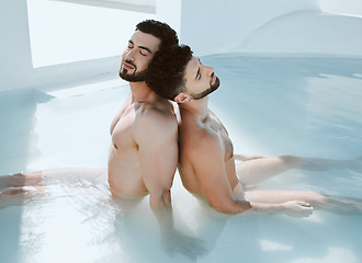 Image showing Calm, sleep and men in a pool for swimming, relaxation and summer enjoyment. Spa, hot tub and or an lgbt gay couple sitting in water for stress relief, comfort and leisure on a luxury holiday