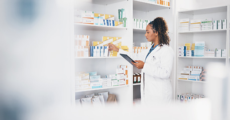 Image showing Tablet, stock and medical with a woman in a pharmacy to fill an online order of prescription treatment. Healthcare, product and insurance with a female pharmacist working as a medicine professional