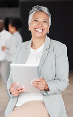 Image showing Happy, corporate and portrait of a woman with a tablet for an email, communication or internet. Smile, mature and an executive manager working on technology at a company for research and the web