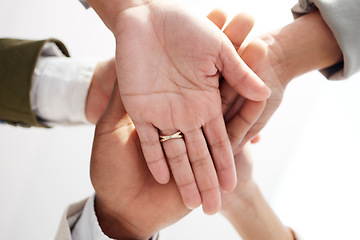 Image showing Teamwork, closeup and hands stacked of support, target or team building mission in circle or group motivation below. Business people, together hand sign in community goals or professional cooperation