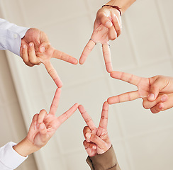 Image showing Star, low angle or business people with peace sign, team work or community collaboration in office building. Partnership, closeup or hands of employees with support, solidarity or motivation together