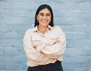 Image showing Portrait, business woman and arms crossed on brick wall background with pride for career. Smile, professional and happiness, proud and confident female entrepreneur from India with success mindset.