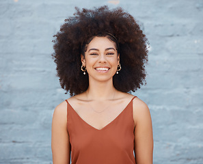 Image showing Portrait, happy woman and smile on brick wall background with happiness and joy. Face, confident and beauty of young, excited and mixed race person, girl or female from South Africa standing alone.