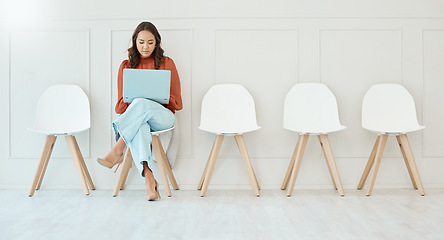 Image showing Waiting room, sitting and a woman with a laptop for email, preparation and interview research. Office, working and corporate employee with a computer for internet, recruitment planning and browsing