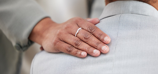 Image showing Support, comfort and hand on back for consoling, empathy and sympathy at work. Console, help and a woman supporting a patient during therapy, counseling or psychological consultation together