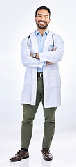 Image showing Happy man, portrait and doctor in a studio with confidence ready for work. Isolated, white background and arms crossed of a proud surgeon with happiness from healthcare, wellness and hospital job