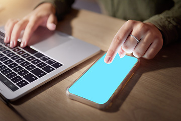 Image showing Closeup, hands or phone green screen for woman in night research, internet logo branding or web design mockup in office. Blue, mock up or technology for working late person on social media mobile app