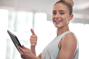 Image showing Tablet, fitness woman portrait and thumbs up of a happy female in a gym with training exercise app. Yes, agreement and motivation hand gesture of a personal trainer with a smile while checking data