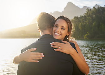 Image showing Wedding, lake and portrait of happy couple hugging in nature and water with passion, smile and romance. Marriage, bride and groom hug to celebrate romantic relationship, loving man and woman together