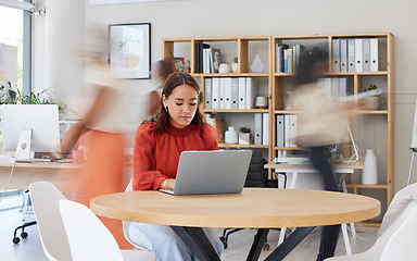 Image showing Blur, business and woman with laptop, focus and deadline for new project, planning and schedule in office. Female employee, agent and manager with device, pc and technology for social media or typing