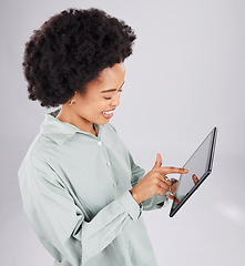 Image showing Digital tablet, search and happy black woman in studio for social media, browsing and internet on grey background. Online, app and female smile while streaming, texting or reading while isolated