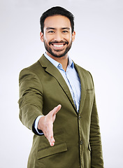 Image showing Studio portrait, happy man and handshake gesture for investment deal, b2b contract or business acquisition agreement. Human resources, hiring welcome and HR hand shake isolated on gray background