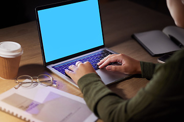 Image showing Hands, woman and laptop with mockup, space and screen in office at night for advertising, marketing and typing. Blank, display and female corporate employee online for branding, design and proposal